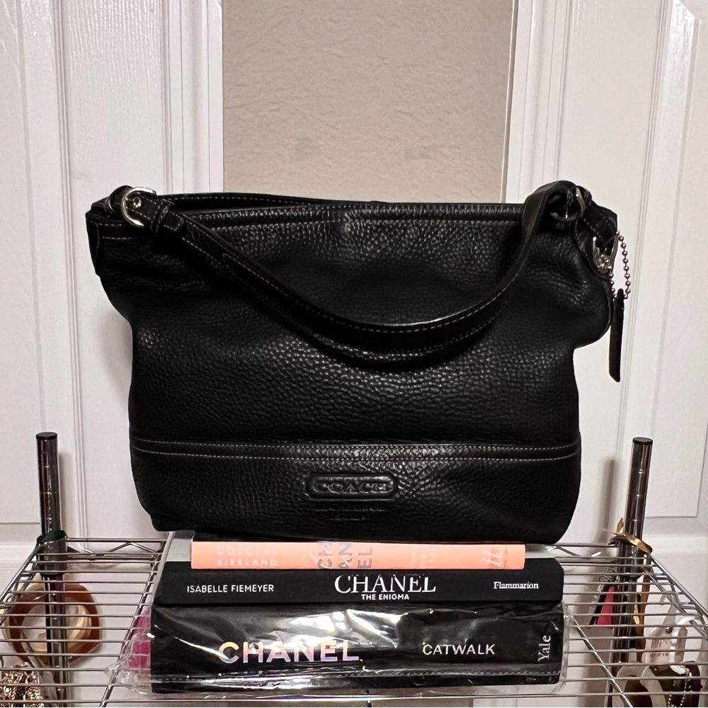 COACH leather shoulder bag with pebble texture finish.